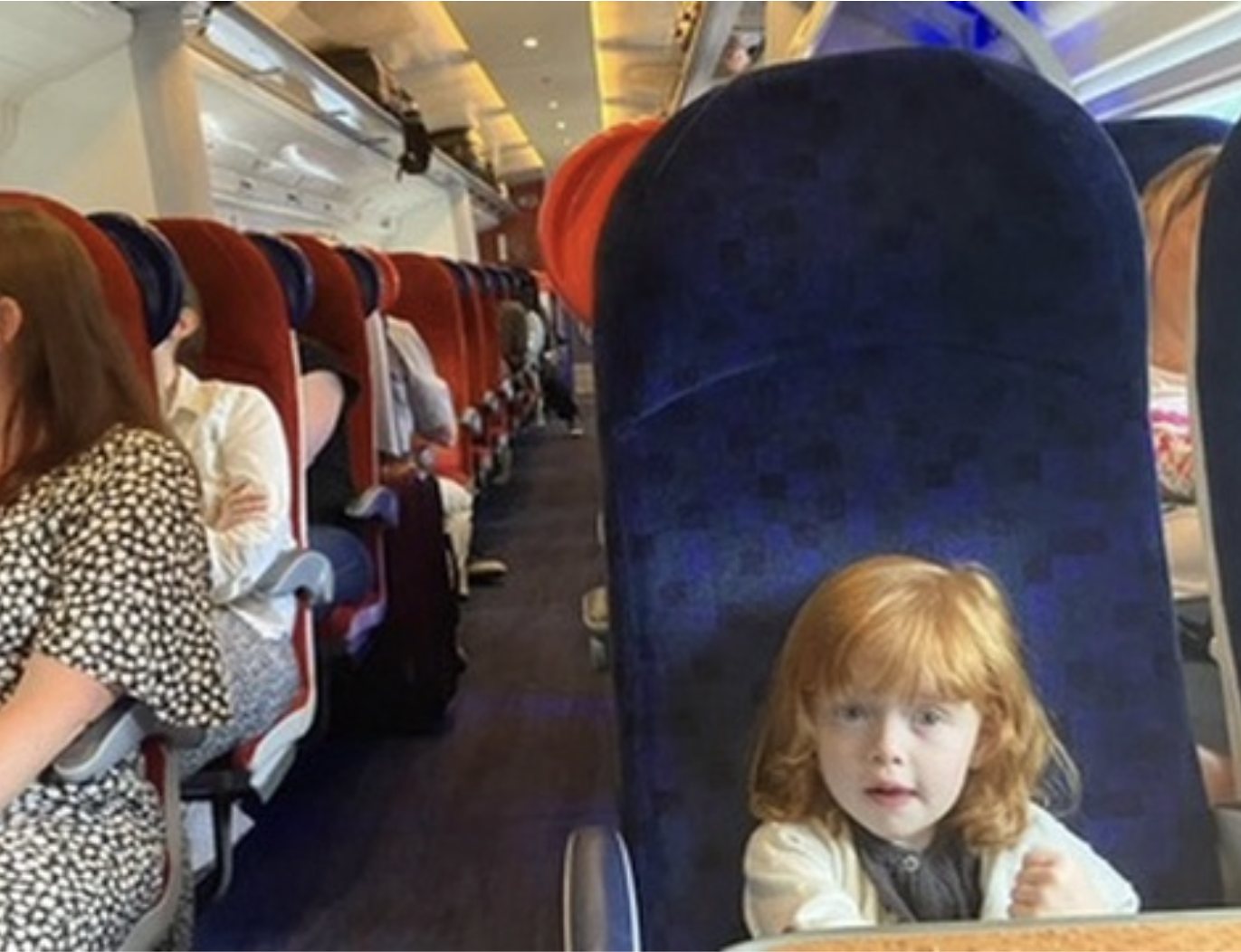 Lucien travelling on a train